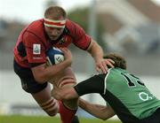 1 October 2005; Mick O'Driscoll, Munster, is tackled by Matt Mostyn, Connacht. Celtic League 2005-2006, Group A, Connacht v Munster, Sportsground, Galway. Picture credit: Matt Browne / SPORTSFILE