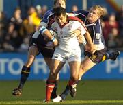 1 October 2005; Kieran Campbell, Ulster, is tackled by Jamie Heaslip, right and Christian Warner, Leinster. Celtic League 2005-2006, Group A, Leinster v Ulster, Donnybrook, Dublin. Picture credit: Damien Eagers / SPORTSFILE