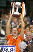 2 October 2005; Bronagh O'Donnell, Armagh, lifts the West County Hotel Cup. TG4 Ladies All-Ireland Junior Football Championship Final, Sligo v Armagh, Croke Park, Dublin. Picture credit: Pat Murphy / SPORTSFILE