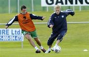 5 October 2005; Damien Duff, Republic of Ireland, in action against team-mate Ian Harte, left, during squad training. Malahide FC, Malahide, Dublin. Picture credit: Pat Murphy / SPORTSFILE
