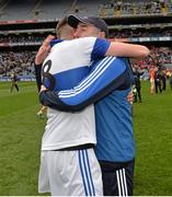 17 March 2014; St Vincent's manager Tommy Conroy congratulates player Daithi Murphy after the match. AIB GAA Football All-Ireland Senior Club Championship Final, Castlebar Mitchels, Mayo, v St Vincent's, Dublin. Croke Park, Dublin. Picture credit: Ramsey Cardy / SPORTSFILE