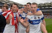 17 March 2014; St Vincent's players, from left to right, Shane Carthy, Tomas Quinn, Ruairi Trainor and Gavin Burke celebrate after the match. AIB GAA Football All-Ireland Senior Club Championship Final, Castlebar Mitchels, Mayo, v St Vincent's, Dublin. Croke Park, Dublin. Picture credit: Ramsey Cardy / SPORTSFILE