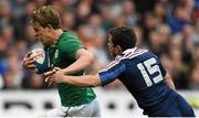 15 March 2014; Andrew Trimble, Ireland, runs in for his side's second try despite Brice Dulin, France. RBS Six Nations Rugby Championship 2014, France v Ireland, Stade De France, Saint Denis, Paris, France. Picture credit: Stephen McCarthy / SPORTSFILE
