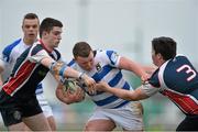 19 March 2014; Niall Higgins, Garbally College, Ballinasloe, is tackled by Daniel Layden, left, and Dairog Smith, Sligo Grammar. Connacht Schools Senior Cup Final, Garbally College, Ballinasloe v Sligo Grammar, Sportsground, Galway. Picture credit: David Maher / SPORTSFILE