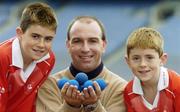 7 October 2005; Kilkenny's DJ Carey with Conor, left, and Donal Timoney, St Brigid’s GAA Club, Dublin, at the announcement of a new Mini-Handball promotion which will see a pack of free handball equipment, games ideas, and in-school coaching available for primary schools and juvenile sections in GAA Clubs throughout the country. Croke Park, Dublin. Picture credit: Damien Eagers / SPORTSFILE