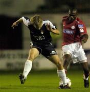 7 October 2005; Joseph Ndo, Shelbourne, in action against Glen Larsen, St. Patrick's Athletic. eircom League, Premier Division, Shelbourne v St. Patrick's Athletic, Tolka Park, Dublin. Picture credit: Brian Lawless / SPORTSFILE