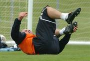 10 October 2005; Shay Given, Republic of Ireland goalkeeper, holds his left foot after falling over on it during squad training. Malahide FC, Malahide, Dublin. Picture credit: David Maher / SPORTSFILE