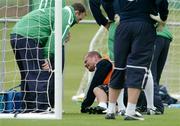 10 October 2005; Shay Given, Republic of Ireland goalkeeper, shows his discomfort after falling over on his left foot during squad training. Malahide FC, Malahide, Dublin. Picture credit: David Maher / SPORTSFILE