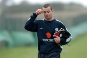 10 October 2005; Shay Given, Republic of Ireland goalkeeper, leaves the pitch after falling over on his left foot during squad training. Malahide FC, Malahide, Dublin. Picture credit: David Maher / SPORTSFILE
