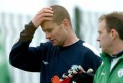 10 October 2005; Republic of Ireland goalkeeper Shay Given leaves the pitch with team physio Ciaran Murray after falling over on his left foot during squad training. Malahide FC, Malahide, Dublin. Picture credit: David Maher / SPORTSFILEE