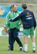 10 October 2005; Brian Kerr, Republic of Ireland manager, with Matt Holland,  during squad training. Malahide FC, Malahide, Dublin. Picture credit: David Maher / SPORTSFILE