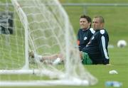 10 October 2005; Robbie Keane and Stephen Carr, Republic of Ireland, watch on during squad training. Malahide FC, Malahide, Dublin. Picture credit: David Maher / SPORTSFILE