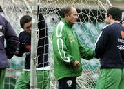 11 October 2005; Brian Kerr, Republic of Ireland manager, speaks to his players as Robbie Keane looks on during squad training. Lansdowne Road, Dublin. Picture credit: David Maher / SPORTSFILE