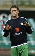 11 October 2005; Robbie Keane, Republic of Ireland, throws a drinking bottle away during squad training. Lansdowne Road, Dublin. Picture credit: David Maher / SPORTSFILE