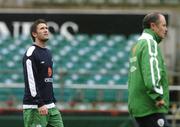 11 October 2005; Robbie Keane, Republic of Ireland, alongside his manager Brian Kerr during squad training. Lansdowne Road, Dublin. Picture credit: David Maher / SPORTSFILE