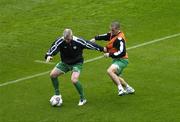 11 October 2005; Graham Kavanagh, Republic of Ireland, in action against his team-mate Liam Miller during squad training. Lansdowne Road, Dublin. Picture credit: Ciara Lyster / SPORTSFILE
