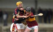 22 March 2014; Cathal McGrath, Kilkenny CBS, in action against Dean Coleman, Scoil na Trinóide Naofa. Masita GAA All-Ireland Post Primary Schools Croke Cup Senior A Hurling Semi-Final, Kilkenny CBS, Kilkenny v Scoil na Trinóide Naofa, Limerick. J.K. Brackens GAA Club, Templemore, Co. Tipperary. Picture credit: Barry Cregg / SPORTSFILE