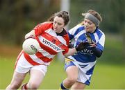 22 March 2014; Danielle Murphy, Cork Institute of Technology, in action against Emily Mulhall, St Patrick's College, Drumcondra. Lynch Cup, Final, Cork Institute of Technology v St Patrick's College, Drumcondra. Queen's University, Belfast, Co. Antrim. Picture credit: Oliver McVeigh / SPORTSFILE