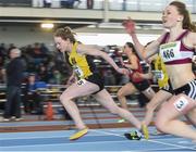 22 March 2014; Sarah Kate Lacey, Kilkenny City Harriers A.C, crosses the finish line ahead of second placed Vicky Harris, Mullingar Harriers A.C., right, to win the U19 Girl's 60m Final. Woodie’s DIY Juvenile Indoor Track and Field Championships, Athlone Institute of Technology Arena, Athlone, Co. Westmeath. Picture credit: Pat Murphy / SPORTSFILE