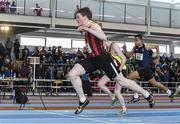 22 March 2014; Daniel Ryan, Moycarkey Coolcroo A.C., crosses the finish line to win the U16 Boy's 60m Final. Woodie’s DIY Juvenile Indoor Track and Field Championships, Athlone Institute of Technology Arena, Athlone, Co. Westmeath. Picture credit: Pat Murphy / SPORTSFILE