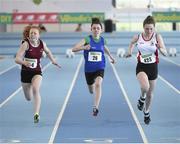 22 March 2014; Alana Ryan, Greystones and District A.C., Wicklow, right, on her way to winning the U15 Girl's 60m Final ahead of second placed Lydia Doyle, Athenry A.C., Galway, left, and Alison Burke, Celtic A.C., centre. Woodie’s DIY Juvenile Indoor Track and Field Championships, Athlone Institute of Technology Arena, Athlone, Co. Westmeath. Picture credit: Pat Murphy / SPORTSFILE