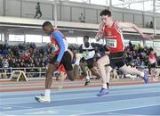 22 March 2014; Tony Odubote, left, Ennis Track AC, Clare, crosses the finish line ahead of David Murphy, Gowran AC, Kilkenny, to win the U15 Boy's 60m Final. Woodie’s DIY Juvenile Indoor Track and Field Championships, Athlone Institute of Technology Arena, Athlone, Co. Westmeath. Picture credit: Pat Murphy / SPORTSFILE