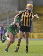 23 March 2014; Lydia Fitzpatrick, Kilkenny, in action against Sarah Carey, Limerick. Irish Daily Star National Camogie League Division 1 Group 1, Kilkenny v Limerick, Nowlan Park, Kilkenny. Picture credit: Ray McManus / SPORTSFILE