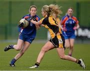 22 March 2014; Orla Finn, Mary Immaculate College Limerick, in action against Enya Farrell, NUI Maynooth. Giles Cup, Final, Mary Immaculate College Limerick v NUI Maynooth. Queen's University, Belfast, Co. Antrim. Picture credit: Oliver McVeigh / SPORTSFILE