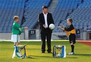 13 October 2005; Connacht manager John O'Mahony with children from Holy Trinity School, Donaghamede, Daniel Guerin, age 10, left, and his cousin Craig Guerin, age 10, at the launch of the M Donnelly Interprovincial Championship 2005. Croke Park, Dublin. Picture credit: Brian Lawless / SPORTSFILE