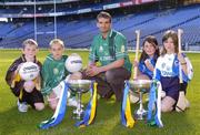 13 October 2005; Laois footballer Noel Garvan with children from Holy Trinity School, Donaghmede, from left to right, Craig Guerin, age 10, Daniel Guerin, age 10, Emma Mulligan, age 10, and Katie Hand, age 10, at the launch of the M Donnelly Interprovincial Championship 2005. Croke Park, Dublin. Picture credit: Brian Lawless / SPORTSFILE