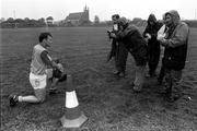 10 September 1992; Donegal footballer Anthony Molloy kneels for photographers during the Donegal press night. Picture credit; Ray McManus / SPORTSFILE