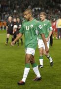 12 October 2005; Dejected Republic of Ireland players Steven Reid and Kenny Cunningham leave the field after the game. FIFA 2006 World Cup Qualifier, Group 4, Republic of Ireland v Switzerland, Lansdowne Road, Dublin. Picture credit: Brendan Moran / SPORTSFILE