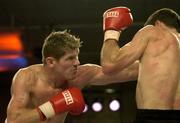 14 October 2005; Jim Rock, left, in action during the fight. IBC World Middleweight title, Jim Rock.v.Alan Jones, National Boxing Stadium, Dublin. Picture credit: Brian Lawless / SPORTSFILE