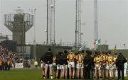 16 October 2005; The Crossmaglen Rangers team stand for the national anthem, with the British Army base in the background. Armagh County Senior Football Final, Crossmaglen Rangers v Dromintee, Crossmaglen, Armagh. Picture credit: David Maher / SPORTSFILE