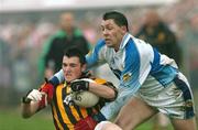 16 October 2005; John Murtagh, Crossmaglen Rangers, in action against Colm McCoy, Dromintee. Armagh County Senior Football Final, Crossmaglen Rangers v Dromintee, Crossmaglen, Armagh. Picture credit: David Maher / SPORTSFILE