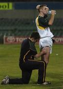 19 October 2005; Chartered Physiotherapist Eoghan O'Neill administers an ice massage on the quad muscle of Mattie Forde after a training session, at the Subiaco Oval, in advance of the Fosters International Rules game between Australia and Ireland. Subiaco Oval, Perth, Western Australia. Picture credit; Ray McManus / SPORTSFILE