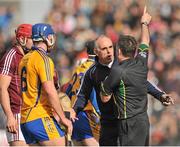 23 March 2014; Galway manager Anthony Cunningham speaks with referee Diarmuid Kirwan which resulted in a free being brought in another thirteen metres. Allianz Hurling League Division 1A Round 5, Clare v Galway, Cusack Park, Ennis, Co. Clare. Picture credit: Ray Ryan / SPORTSFILE