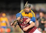 23 March 2014; Damien Hayes, Galway, in action against Patrick Donnellan, Clare. Allianz Hurling League Division 1A Round 5, Clare v Galway, Cusack Park, Ennis, Co. Clare. Picture credit: Ray Ryan / SPORTSFILE