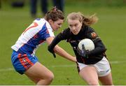 21 March 2014;Hannah Landers, Carlow Institute of Technology , in action against Emma Coakley, Mary Immaculate College Limerick. Giles Cup, Semi-Final, Mary Immaculate College Limerick v Carlow Institute of Technology. Queen's University, Belfast, Co. Antrim. Picture credit: Oliver McVeigh / SPORTSFILE