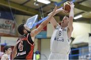 23 March 2014; Shane Coughlan, C&S UCC Demons, attempts a shot while being defended by Isaac Westbrooks, Killester. Basketball Ireland Champions Trophy Final, C&S UCC Demons, Cork v Killester, Dublin. Neptune Stadium, Cork. Picture credit: Brendan Moran / SPORTSFILE