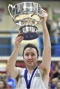 23 March 2014; C&S UCC Demons captain Shane Coughlan lifts the trophy after the game. Basketball Ireland Champions Trophy Final, C&S UCC Demons, Cork v Killester, Dublin. Neptune Stadium, Cork. Picture credit: Brendan Moran / SPORTSFILE