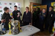23 March 2014; Alan Cawley draws the name of Collinstown FC, in the company of Aidan Power, left, and FAI Junior Council President Teresa McCabe during the FAI Junior Cup Semi-Final Draw. Carew Park, Limerick. Picture credit: Diarmuid Greene / SPORTSFILE