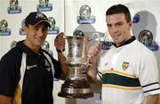 20 October 2005; Rival captains Andrew McLeod and Padraic Joyce hold the Cormac McAnallen Cup after the final Press Conference advance of the Fosters International Rules game between Australia and Ireland, Sheraton Perth Hotel, Adelaide Terrace, Perth, Western Australia. Picture credit; Ray McManus / SPORTSFILE