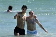 20 October 2005; The two All-Ireland winning captains Sean Og O hAilpin of Cork and Brian Dooher, of Tyrone, during a swim in the Indian Ocean at Cottesloe Beach advance of the Fosters International Rules game between Australia and Ireland. Cottesloe, Perth, Western Australia. Picture credit; Ray McManus / SPORTSFILE