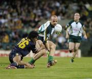 20 October 2005; Tom Kelly, Ireland, is tackled by Aaron Davey, Australia. 2005 Fosters International Rules series game 1, Australia v Ireland, Subiaco Oval, Perth, Western Australia. Picture credit; Ray McManus / SPORTSFILE