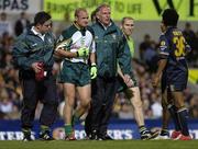 20 October 2005; Eoghan O'Neill, left, and Dr. Con Murphy assist Tom Kelly, Ireland, 2005 Fosters International Rules Series, game 1, Australia v Ireland, Subiaco Oval, Perth, Western Australia. Picture credit; Ray McManus / SPORTSFILE
