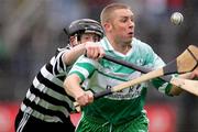 23 October 2005; Patsy Keyes, Wolfe Tones, in action against Jonathon Clancy, Clarecastle. Clare Senior Hurling Championship Final, Wolfe Tones v Clarecastle. Cusack Park, Ennis, Co. Clare. Picture credit: Kieran Clancy / SPORTSFILE