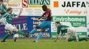 23 October 2005; Jermaine Sandvliet, Drogheda United, defeats Bray Wanderers players Stephen Gifford, left, and Michael Roche to score his sides second goal. FAI Carlsberg Cup Semi-Final, Drogheda United v Bray Wanderers, United Park, Drogheda, Co. Louth. Picture credit: David Maher / SPORTSFILE