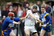23 October 2005; Diarmuid Cloonan, Athenry, in action against Johnny O'Loughlin, Loughrea. Galway Senior Hurling Championship Semi-Final, Athenry v Loughrea. Athenry, Galway. Picture credit: Damien Eagers / SPORTSFILE