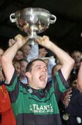23 October 2005; Nemo Rangers captain Martin Cronin lifts the cup after the game. Cork Senior Football Championship Final, Nemo Rangers v Muskerry. Pairc Ui Chaoimh, Cork. Picture credit: Brendan Moran / SPORTSFILE